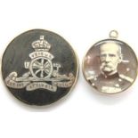 9ct gold double locket pendant with war photos/graphs inserted and a silver tortoiseshell badge. P&P