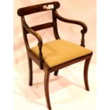 A Regency mahogany gentlemans desk chair with a later upholstered drop-in seat. Not available for