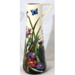 Moorcroft jug in the Walnut Tree pattern, H: 18 cm. P&P Group 2 (£18+VAT for the first lot and £3+