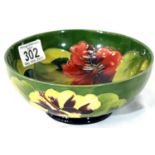 Moorcroft bowl in the Green Ground Hibiscus pattern, D: 16 cm. P&P Group 2 (£18+VAT for the first