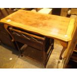 Yew wood coffee table and stained bamboo hallway cabinet with single drawer. Not available for in-