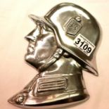 A polished metal SS soldiers side profile, wall or door mounting with threaded holes verso, H: 21