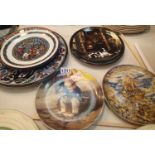 Collection of mixed ceramic plates and charges including limited edition examples. Not available for