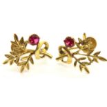 A pair of 9ct gold stone set screw-back earrings, floral design, 2.8g. P&P Group 1 (£14+VAT for