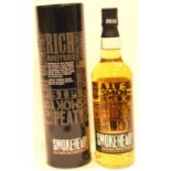 Bottle of Smokehead Islay single malt whisky. P&P Group 2 (£18+VAT for the first lot and £3+VAT
