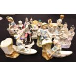 Continental figurines of boys playing on chair, H: 12.5 cm. P&P Group 3 (£25+VAT for the first lot