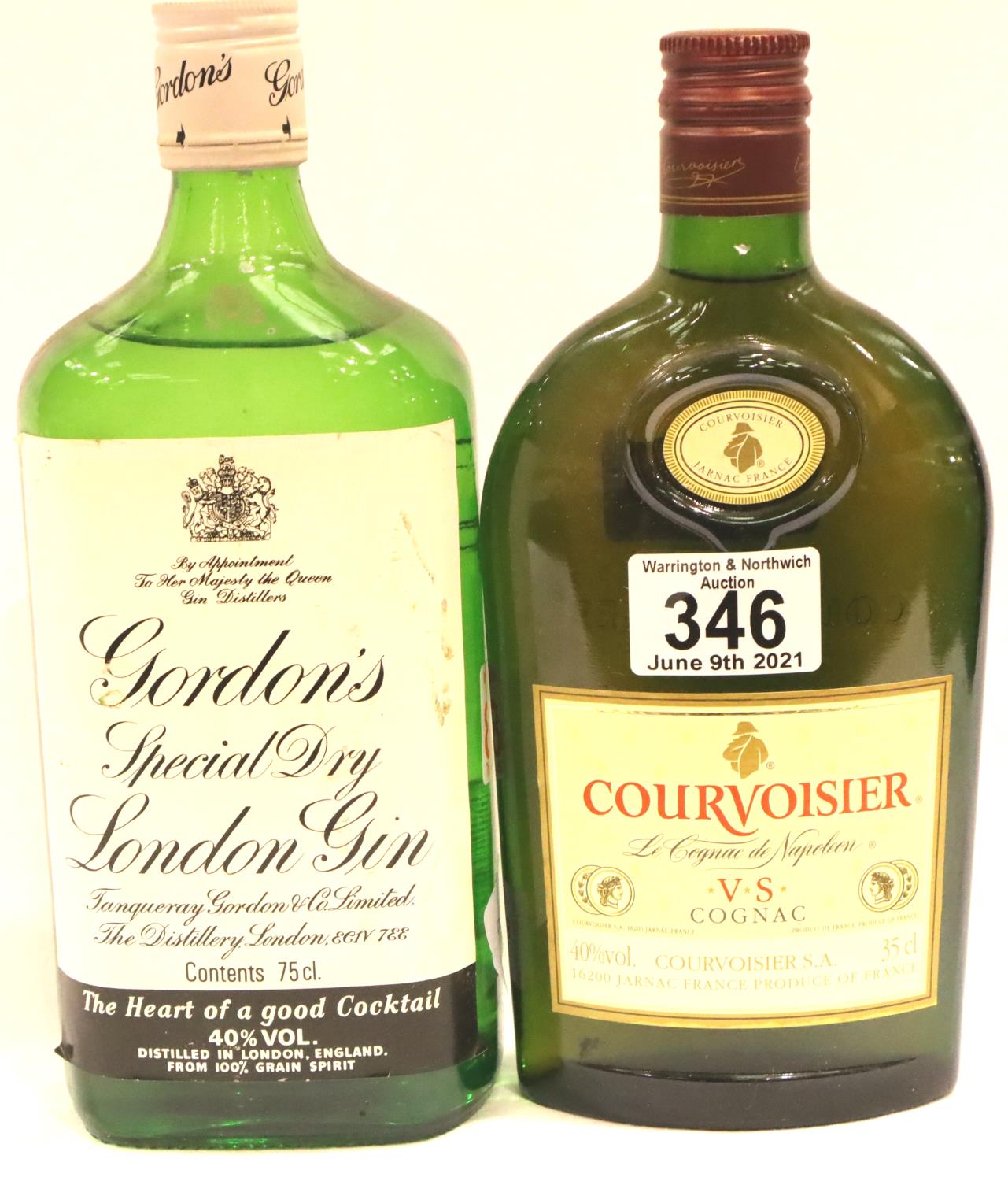 Bottle of Gordons gin and a half bottle of Courvoisier Cognac. P&P Group 2 (£18+VAT for the first