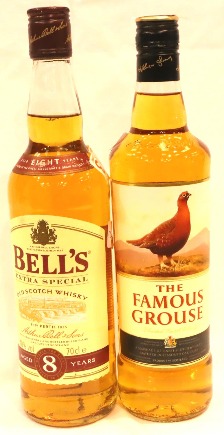 Bottle of Bells and a bottle of Famous Grouse whisky. P&P Group 3 (£25+VAT for the first lot and £