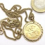 Mounted gold sovereign George V 1910 on 9ct gold chain, chain L: 52 cm, total 12.1g. P&P Group 1 (£