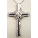 18ct gold diamond cross pendant with 0.96ct of diamonds on a 18ct white gold chain. P&P Group 1 (£