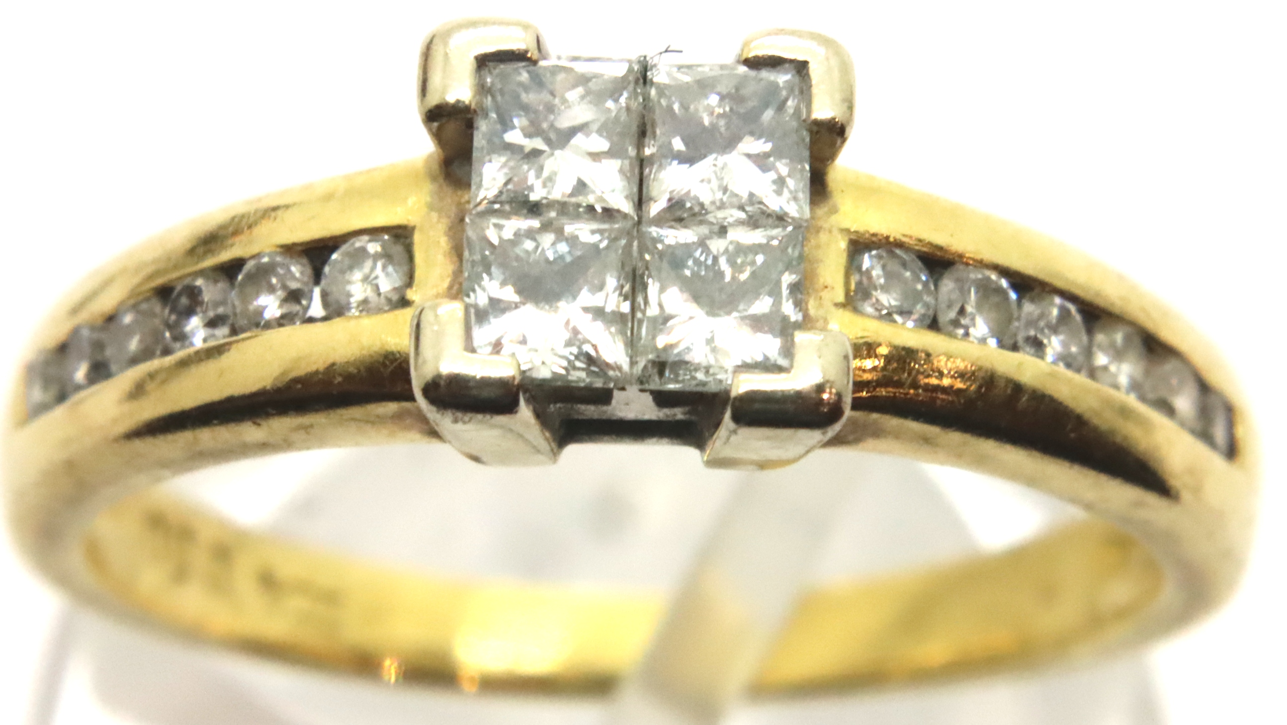 18ct gold and diamond four stone diamond ring with diamond shoulders in Goldsmiths box, size N, 3.