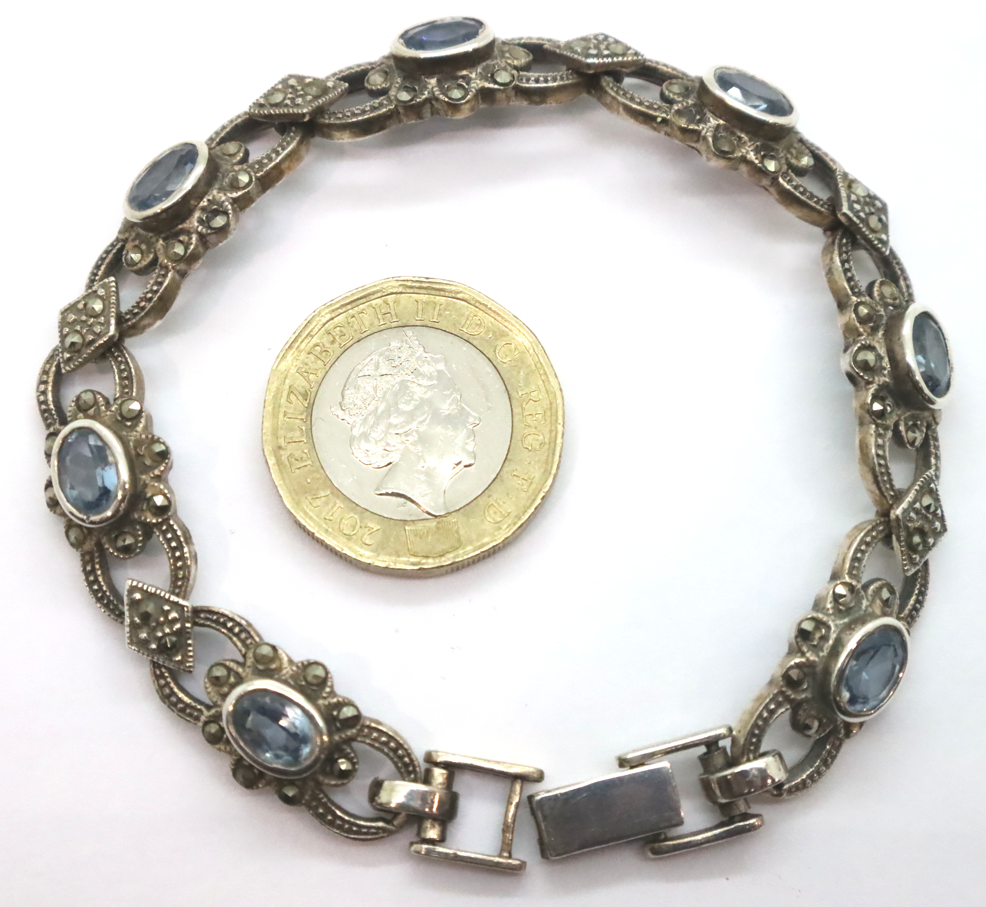 Marcasite bracelet set with blue topaz. P&P Group 1 (£14+VAT for the first lot and £1+VAT for