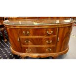 A 20th century walnut three drawer, two door sideboard in the Epstein style, raised on claw and ball