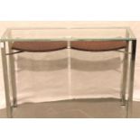 A contemporary chrome console with rectangular plate glass top and two shelves below, 100 x 30 x