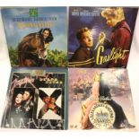 Four laser discs 1990s; Gaslight, National Velvet, Mutiny on The Bounty and The Killer. P&P Group