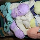 Box of mixed knitting wools including baby wool, double knit and chunky. Not available for in-