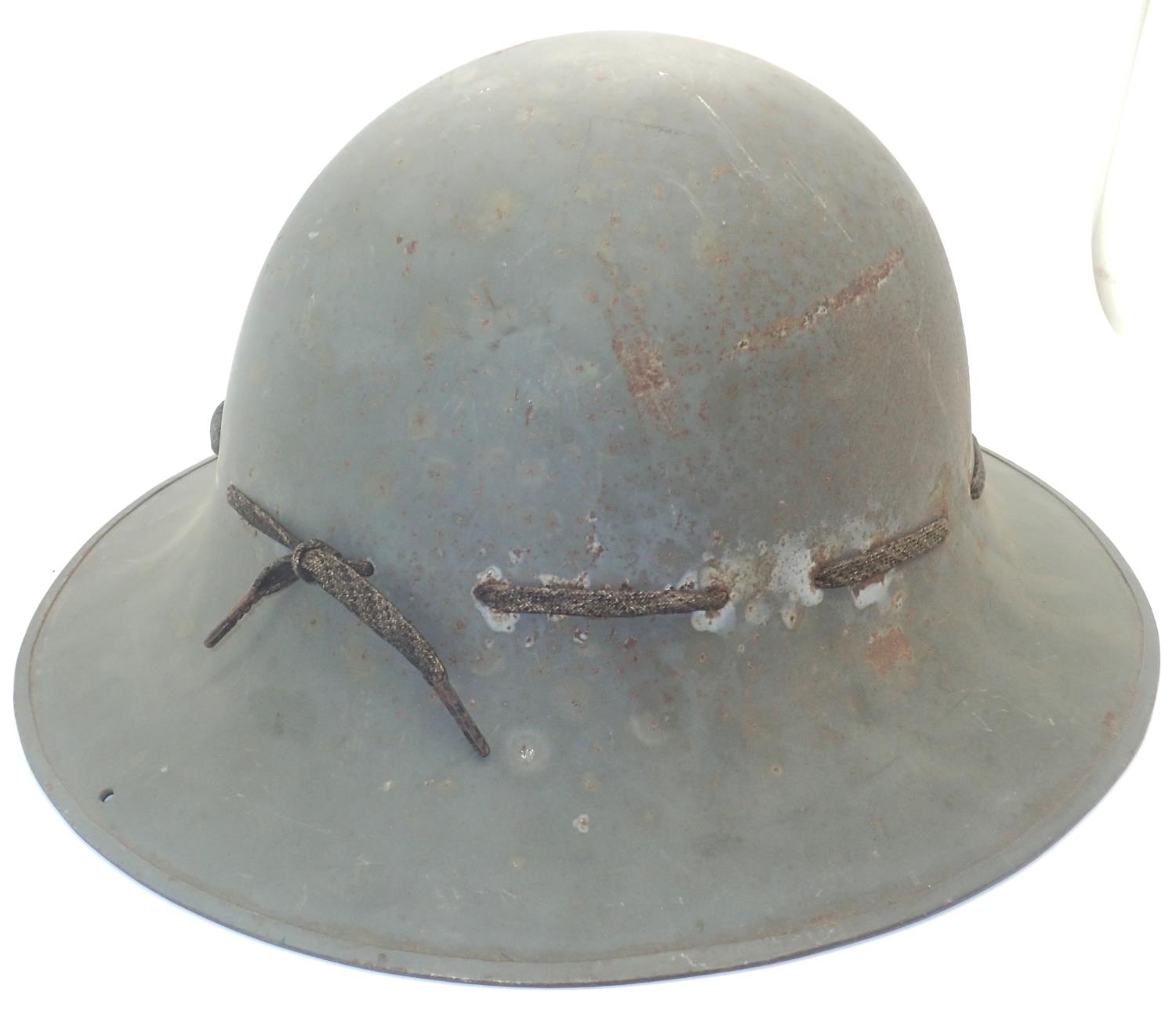 WWII Zuckerman helmet, marked with Allen West factory logo and leather liner, this company made