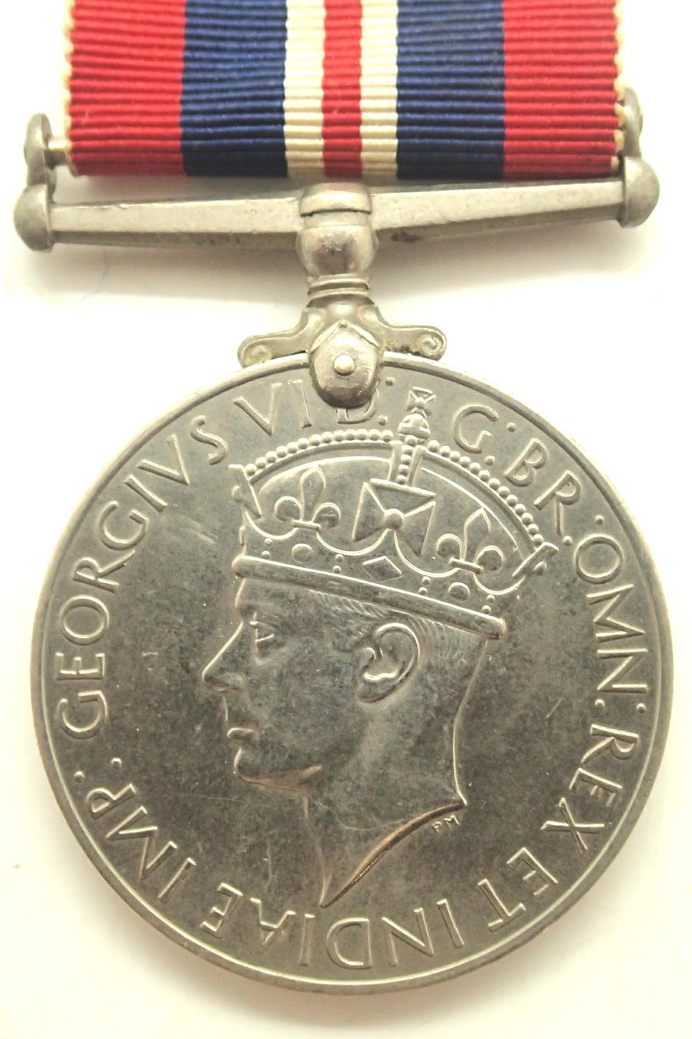 British WWII Defense medal. P&P Group 1 (£14+VAT for the first lot and £1+VAT for subsequent lots)