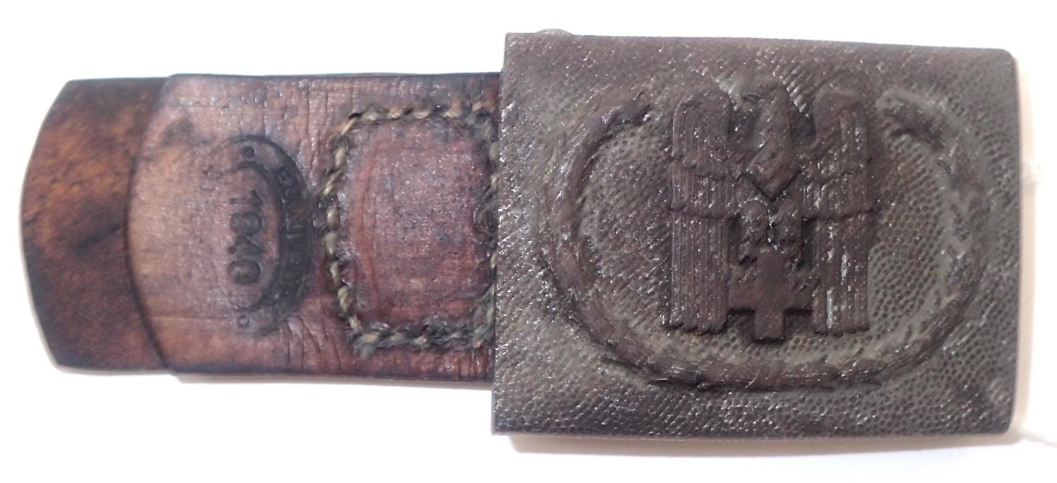 1940 dated Third Reich DRK belt buckle on leather tab. P&P Group 1 (£14+VAT for the first lot and £