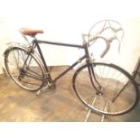 A 23'' frame vintage road bike with upgraded Shimano cogs, a mountain LX Addrelia, a bike pump and