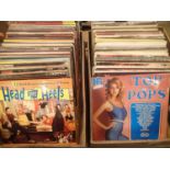 Two boxes of mixed records including John Lennon, Eric Clapton and Rod Stewart. Not available for