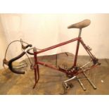 A vintage Raleigh Sirocco 23'' racing bike frame with a exage fixed adrelia, a Shimano crank,