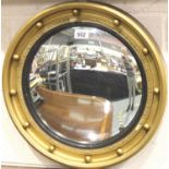 Gilt wood Regency style framed convex circular mirror with ball decoration, D: 30 cm. Not