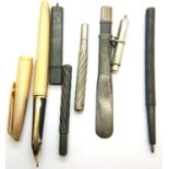 Waterman; a gold plated fountain pen with an 18ct gold nib together with a collection of silver