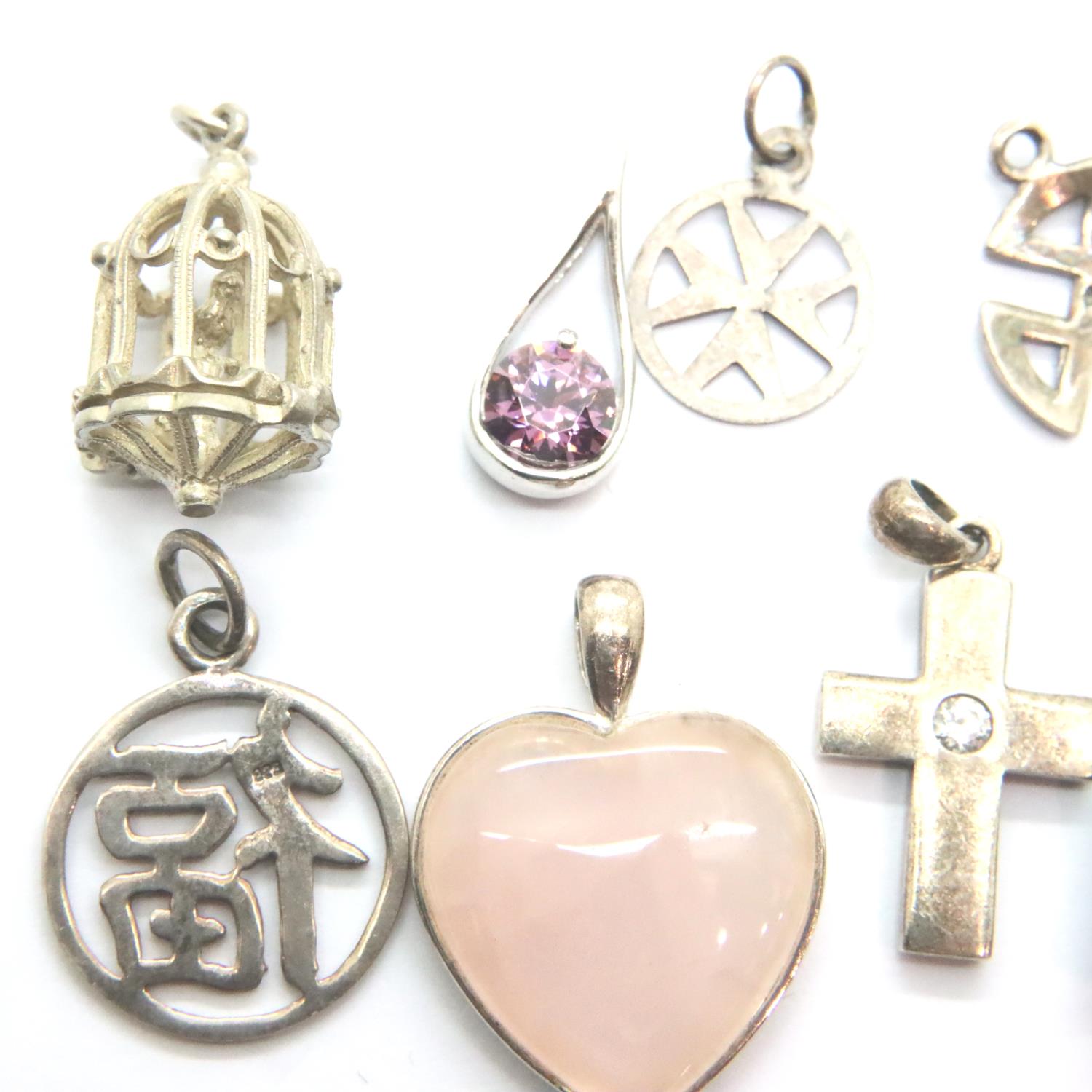 Ten assorted silver charms, including stone set examples, combined 25g. P&P Group 1 (£14+VAT for the - Image 2 of 3