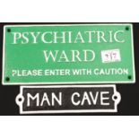 Cast iron Psychiatric Ward sign with a Man Cave sign. P&P Group 2 (£18+VAT for the first lot and £