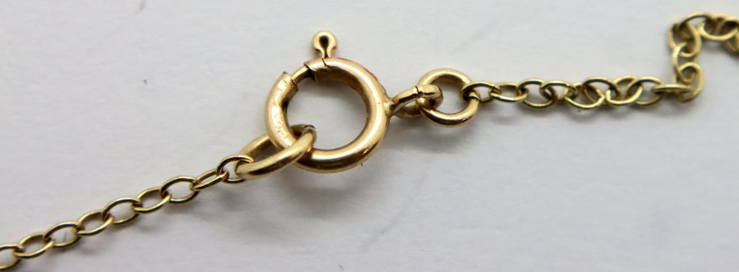 Yellow gold chain and a broken 9ct gold sovereign mount. P&P Group 1 (£14+VAT for the first lot - Image 3 of 3