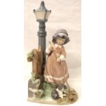 Large Lladro girl, Sweeping Leaves by Lamppost, H: 35 cm. P&P Group 3 (£25+VAT for the first lot and