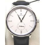 New and boxed Ornake gents wristwatch with white dial and leather strap. P&P Group 1 (£14+VAT for