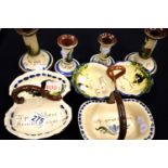 Torquay Ware three handled dishes and two pairs of candlesticks. P&P Group 3 (£25+VAT for the