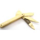 Folding bone tooth pick. P&P Group 1 (£14+VAT for the first lot and £1+VAT for subsequent lots)