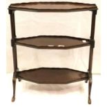 An Edwardian mahogany three-tier etagere with lozenge-shaped shelves, 58 x 35 x 64 cm. Not available