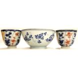 Pair of 19th century Chinese tea bowls and an early blue-over-white painted export rice bowl, each