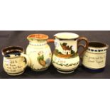 Four large Torquay Ware jugs, largest H: 16 cm. &P Group 3 (£25+VAT for the first lot and £5+VAT for