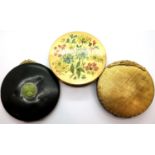 Three vintage compacts; one set with a carved jade panel and marcasite, two further examples, all