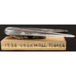 Car bonnet mascot; 1938 Vauxhall Tourer, L: 14 cm. P&P Group 2 (£18+VAT for the first lot and £3+VAT