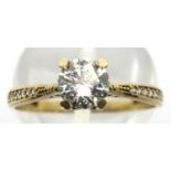 9ct gold solitaire dress ring with stone set shoulders, size O/P, 1.3g. P&P Group 1 (£14+VAT for the