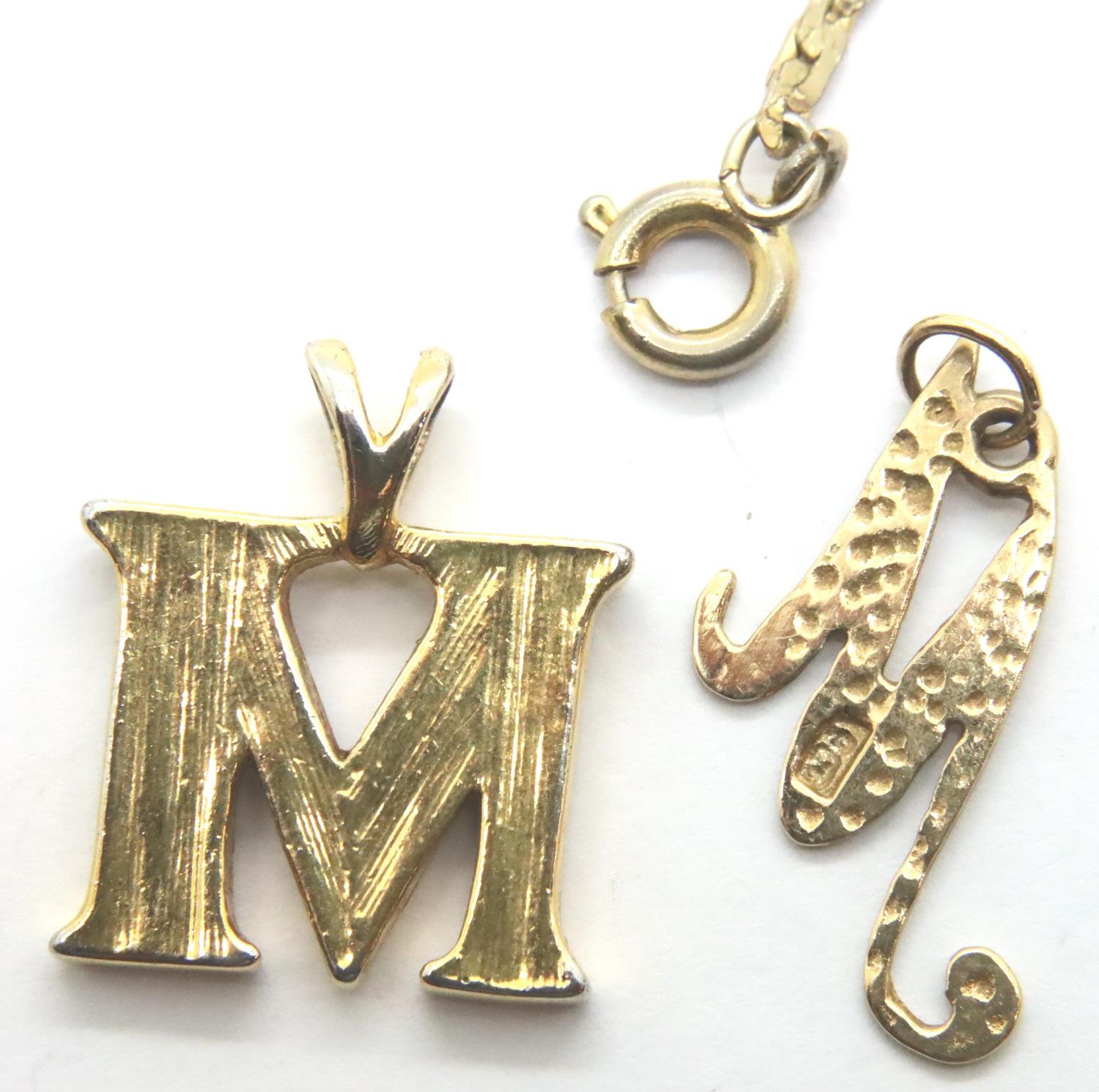 9ct gold letter M pendant, a further stone-set letter M pendant and a bracelet. P&P Group 1 (£14+VAT - Image 3 of 3