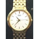 Seiko gents mid-size Quartz wristwatch on a gold plated bracelet. P&P Group 1 (£14+VAT for the first