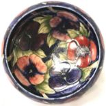 Large Moorcroft footed bowl with inverted rim in the Blue Pansies pattern, tube line decorated, D: