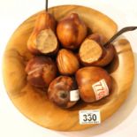 Walnut bowl of carved wooden fruit. P&P Group 3 (£25+VAT for the first lot and £5+VAT for subsequent