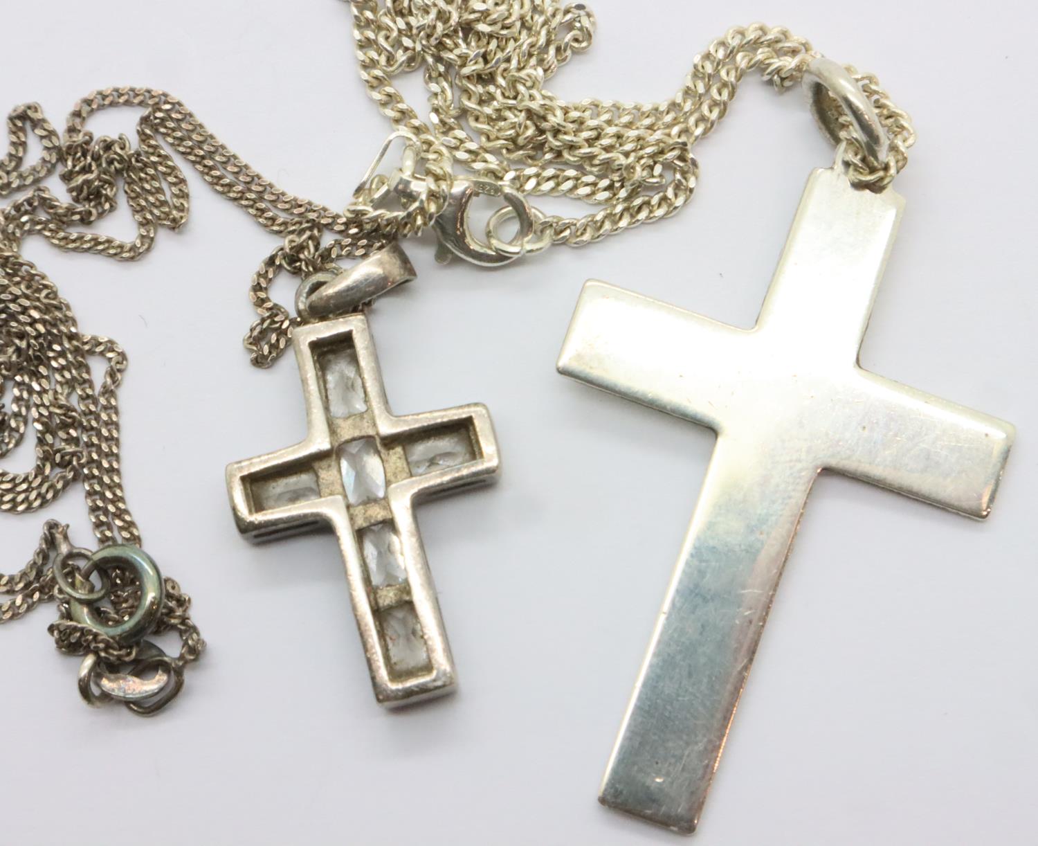 Two silver crosses and chains, one stone set. P&P Group 1 (£14+VAT for the first lot and £1+VAT - Image 2 of 2
