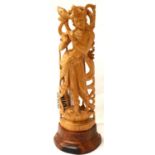 Buddhist carved Goddess figurine, H: 24 cm. P&P Group 2 (£18+VAT for the first lot and £3+VAT for