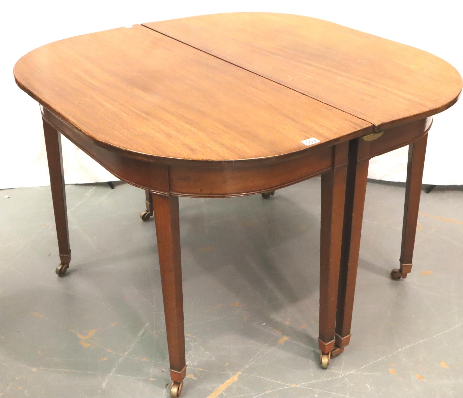 A George III mahogany extending dining table raised on tapering supports, 175 x 114 x 75 cm H. Not