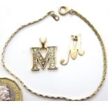9ct gold letter M pendant, a further stone-set letter M pendant and a bracelet. P&P Group 1 (£14+VAT