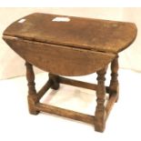 19th century country oak drop-leaf table of small proportions, jointed construction with turned